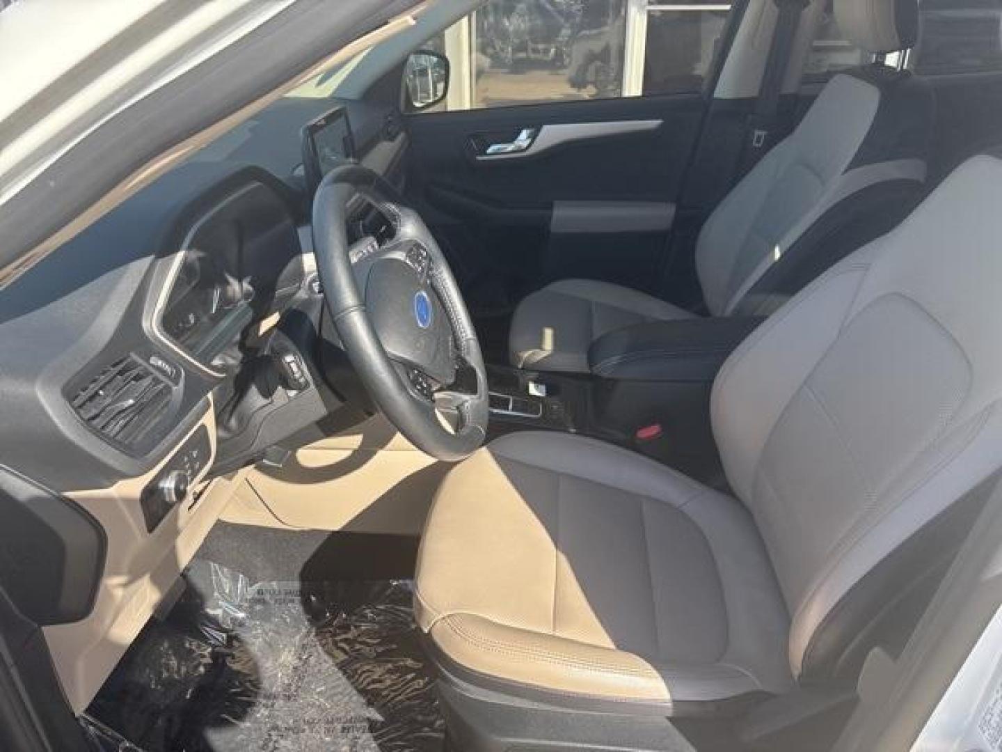 2020 White /Sandstone Ford Escape SEL (1FMCU0H61LU) with an 1.5L EcoBoost engine, Automatic transmission, located at 1105 E Mulberry, Kaufman, TX, 75142, (972) 962-2151, 32.589550, -96.300926 - White 2020 Ford Escape 4D Sport Utility SEL FWD 8-Speed Automatic 1.5L EcoBoost<br><br><br>Odometer is 13324 miles below market average! 27/33 City/Highway MPG<br><br>Awards:<br> * JD Power Automotive Performance, Execution and Layout (APEAL) Study<br>Please call Paul Murrey Ford Inc. In Kaufman Te - Photo#9