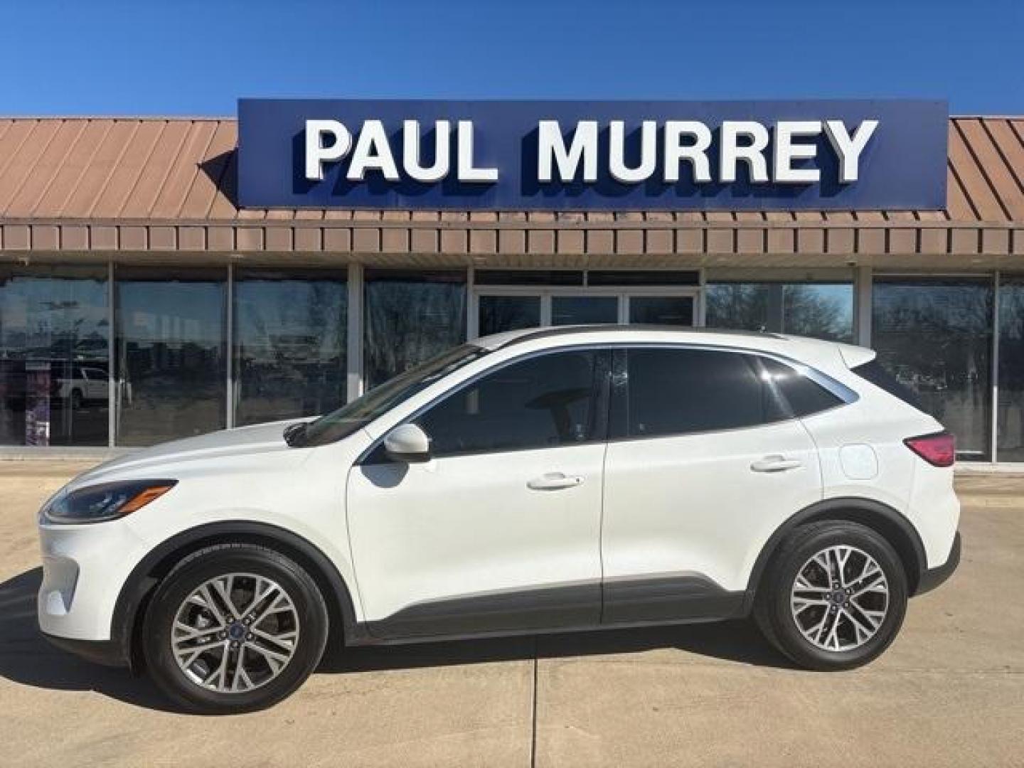 2020 White /Sandstone Ford Escape SEL (1FMCU0H61LU) with an 1.5L EcoBoost engine, Automatic transmission, located at 1105 E Mulberry, Kaufman, TX, 75142, (972) 962-2151, 32.589550, -96.300926 - White 2020 Ford Escape 4D Sport Utility SEL FWD 8-Speed Automatic 1.5L EcoBoost<br><br><br>Odometer is 13324 miles below market average! 27/33 City/Highway MPG<br><br>Awards:<br> * JD Power Automotive Performance, Execution and Layout (APEAL) Study<br>Please call Paul Murrey Ford Inc. In Kaufman Te - Photo#0