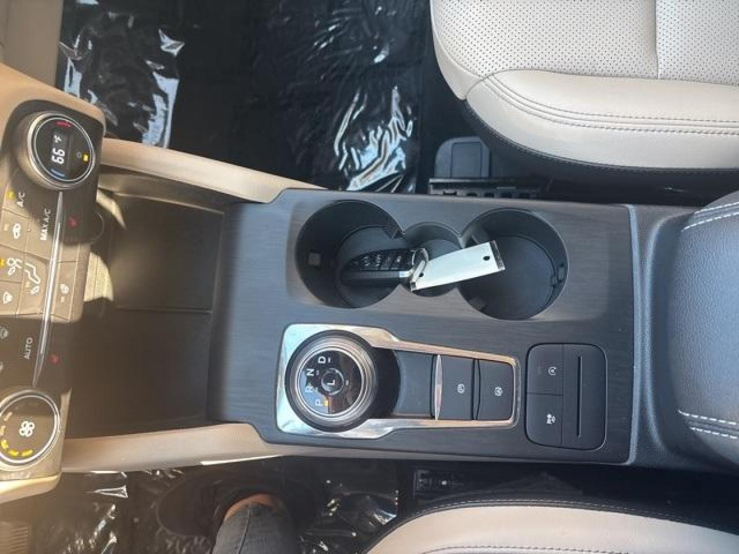 2020 White /Sandstone Ford Escape SEL (1FMCU0H61LU) with an 1.5L EcoBoost engine, Automatic transmission, located at 1105 E Mulberry, Kaufman, TX, 75142, (972) 962-2151, 32.589550, -96.300926 - White 2020 Ford Escape 4D Sport Utility SEL FWD 8-Speed Automatic 1.5L EcoBoost<br><br><br>Odometer is 13324 miles below market average! 27/33 City/Highway MPG<br><br>Awards:<br> * JD Power Automotive Performance, Execution and Layout (APEAL) Study<br>Please call Paul Murrey Ford Inc. In Kaufman Te - Photo#20