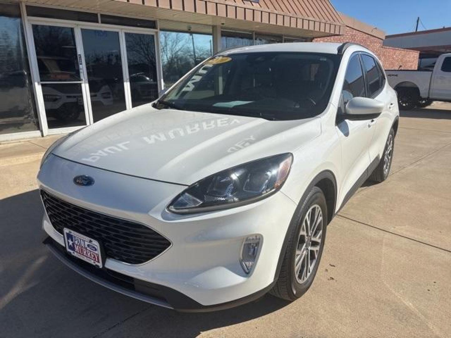 2020 White /Sandstone Ford Escape SEL (1FMCU0H61LU) with an 1.5L EcoBoost engine, Automatic transmission, located at 1105 E Mulberry, Kaufman, TX, 75142, (972) 962-2151, 32.589550, -96.300926 - White 2020 Ford Escape 4D Sport Utility SEL FWD 8-Speed Automatic 1.5L EcoBoost<br><br><br>Odometer is 13324 miles below market average! 27/33 City/Highway MPG<br><br>Awards:<br> * JD Power Automotive Performance, Execution and Layout (APEAL) Study<br>Please call Paul Murrey Ford Inc. In Kaufman Te - Photo#1