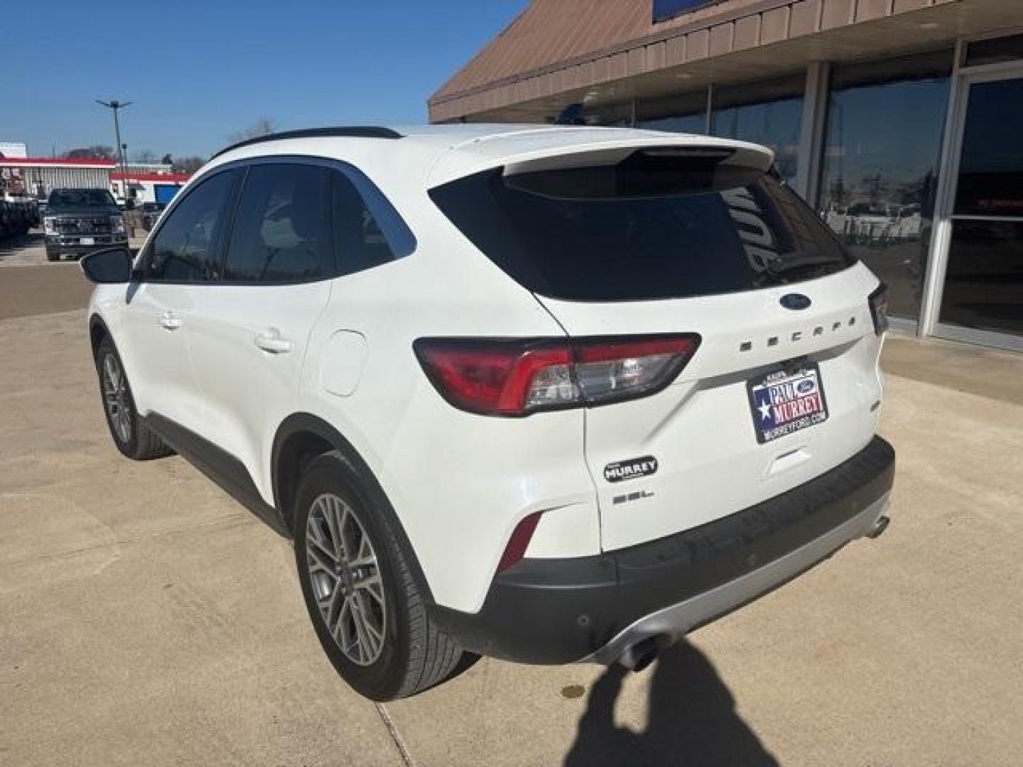 2020 White /Sandstone Ford Escape SEL (1FMCU0H61LU) with an 1.5L EcoBoost engine, Automatic transmission, located at 1105 E Mulberry, Kaufman, TX, 75142, (972) 962-2151, 32.589550, -96.300926 - White 2020 Ford Escape 4D Sport Utility SEL FWD 8-Speed Automatic 1.5L EcoBoost<br><br><br>Odometer is 13324 miles below market average! 27/33 City/Highway MPG<br><br>Awards:<br> * JD Power Automotive Performance, Execution and Layout (APEAL) Study<br>Please call Paul Murrey Ford Inc. In Kaufman Te - Photo#3