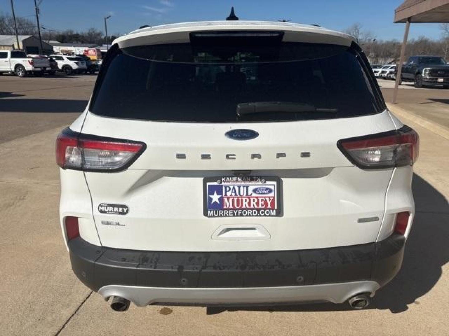 2020 White /Sandstone Ford Escape SEL (1FMCU0H61LU) with an 1.5L EcoBoost engine, Automatic transmission, located at 1105 E Mulberry, Kaufman, TX, 75142, (972) 962-2151, 32.589550, -96.300926 - White 2020 Ford Escape 4D Sport Utility SEL FWD 8-Speed Automatic 1.5L EcoBoost<br><br><br>Odometer is 13324 miles below market average! 27/33 City/Highway MPG<br><br>Awards:<br> * JD Power Automotive Performance, Execution and Layout (APEAL) Study<br>Please call Paul Murrey Ford Inc. In Kaufman Te - Photo#4