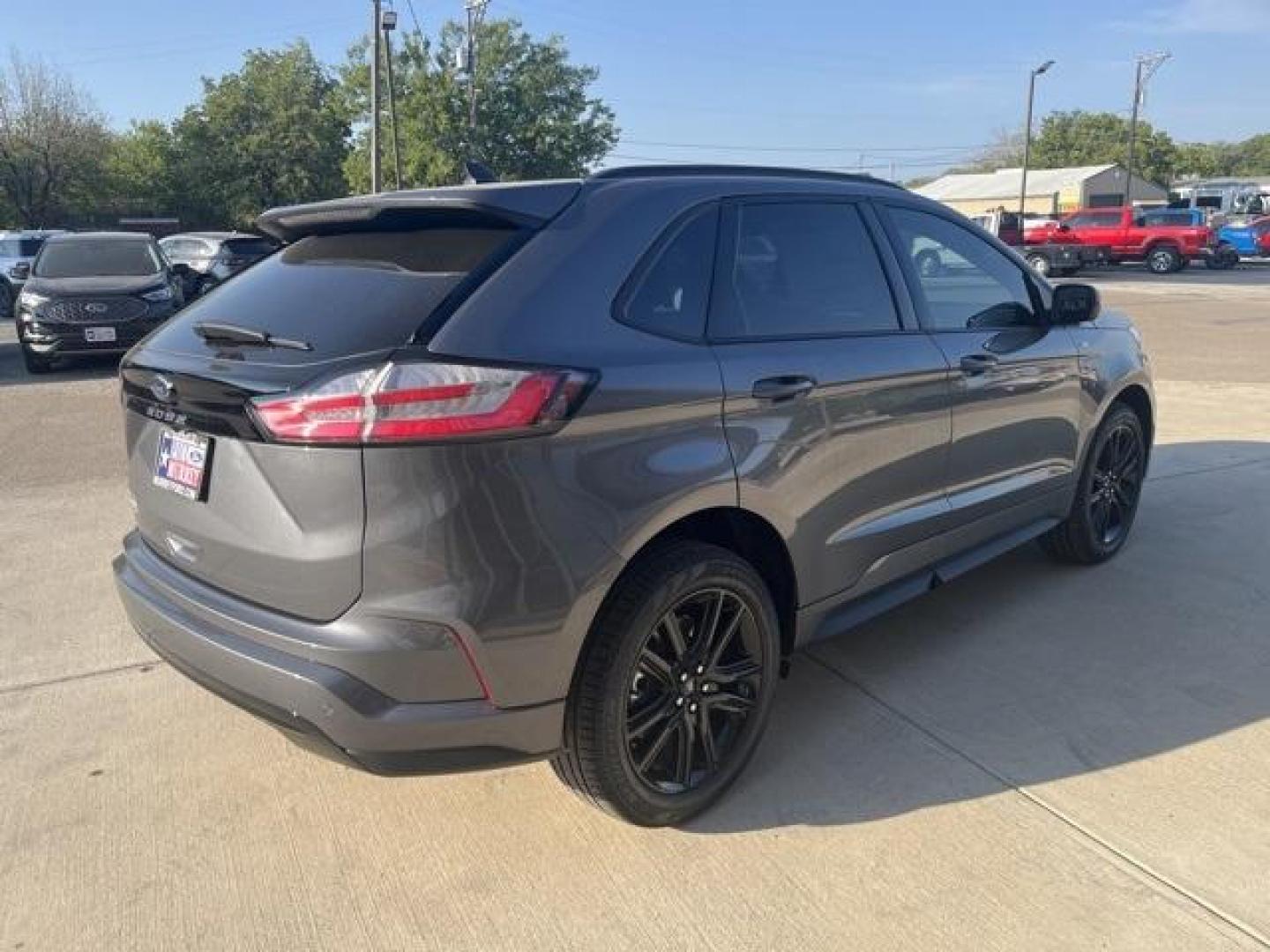 2024 Carbonized Gray Metallic /Ebony Ford Edge ST Line (2FMPK4J98RB) with an EcoBoost 2.0L I4 GTDi DOHC Turbocharged VCT engine, Automatic transmission, located at 1105 E Mulberry, Kaufman, TX, 75142, (972) 962-2151, 32.589550, -96.300926 - Carbonized Gray Metallic 2024 Ford Edge 4D Sport Utility ST Line AWD 8-Speed Automatic EcoBoost 2.0L I4 GTDi DOHC Turbocharged VCT AWD.<br><br>21/28 City/Highway MPG<br><br><br>Please call Paul Murrey Ford Inc. In Kaufman Texas A Family Dealership Since 1952 Serving the Dallas Fort Worth and East Te - Photo#5