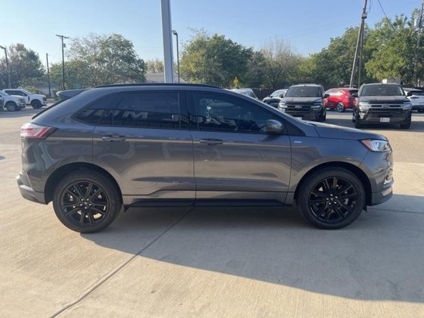 2024 Carbonized Gray Metallic /Ebony Ford Edge ST Line (2FMPK4J98RB) with an EcoBoost 2.0L I4 GTDi DOHC Turbocharged VCT engine, Automatic transmission, located at 1105 E Mulberry, Kaufman, TX, 75142, (972) 962-2151, 32.589550, -96.300926 - Carbonized Gray Metallic 2024 Ford Edge 4D Sport Utility ST Line AWD 8-Speed Automatic EcoBoost 2.0L I4 GTDi DOHC Turbocharged VCT AWD.<br><br>21/28 City/Highway MPG<br><br><br>Please call Paul Murrey Ford Inc. In Kaufman Texas A Family Dealership Since 1952 Serving the Dallas Fort Worth and East Te - Photo#6