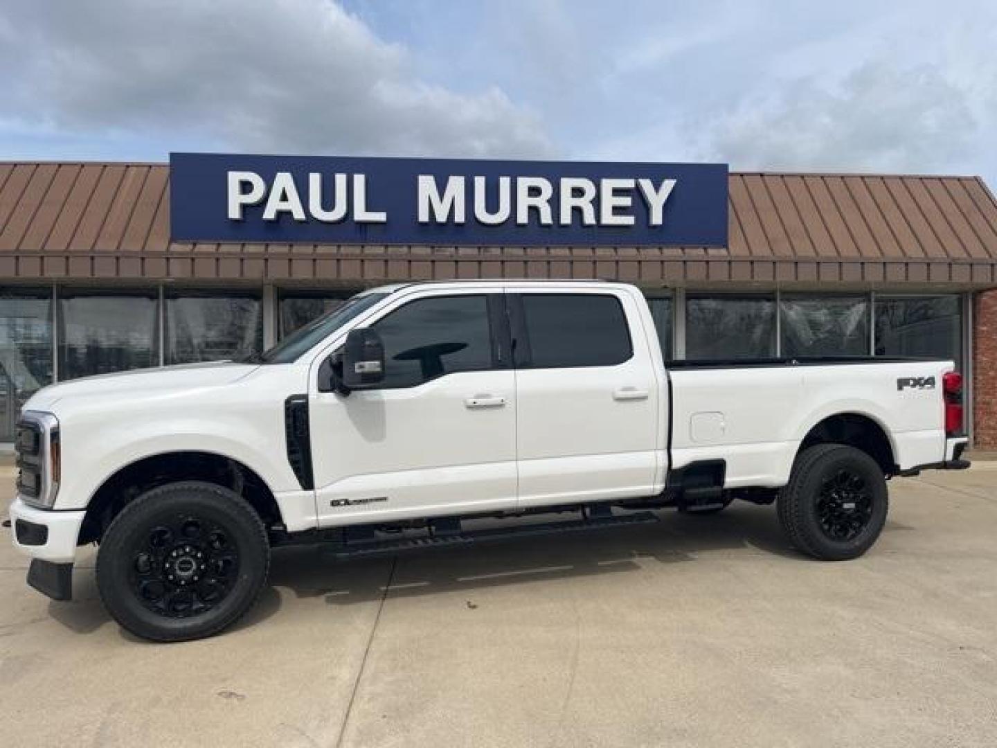 2024 Star White Metallic Tri-Coat /Black Onyx Ford F-350SD Lariat (1FT8W3BT6RE) with an Power Stroke 6.7L V8 DI 32V OHV Turbodiesel engine, Automatic transmission, located at 1105 E Mulberry, Kaufman, TX, 75142, (972) 962-2151, 32.589550, -96.300926 - Star White Metallic Tri-Coat 2024 Ford F-350SD 4D Crew Cab Lariat 4WD 10-Speed Automatic Power Stroke 6.7L V8 DI 32V OHV Turbodiesel 4WD.<br><br><br>Please call Paul Murrey Ford Inc. In Kaufman Texas A Family Dealership Since 1952 Serving the Dallas Fort Worth and East Texas areas for over 70 years. - Photo#0