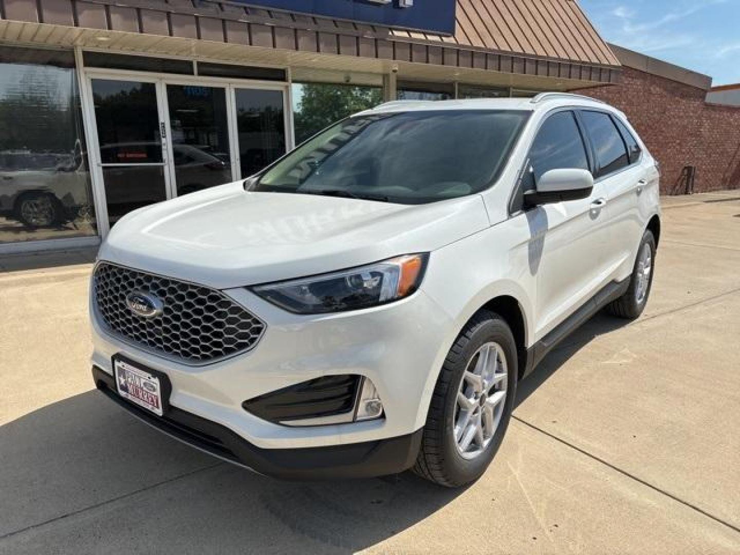 2024 Star White Metallic Tri-Coat /Dune Ford Edge (2FMPK4J99RB) with an EcoBoost 2.0L I4 GTDi DOHC Turbocharged VCT engine, Automatic transmission, located at 1105 E Mulberry, Kaufman, TX, 75142, (972) 962-2151, 32.589550, -96.300926 - Star White Metallic Tri-Coat 2024 Ford Edge 4D Sport Utility AWD 8-Speed Automatic EcoBoost 2.0L I4 GTDi DOHC Turbocharged VCT AWD.<br><br>21/28 City/Highway MPG<br><br><br>Please call Paul Murrey Ford Inc. In Kaufman Texas A Family Dealership Since 1952 Serving the Dallas Fort Worth and East Texas - Photo#1