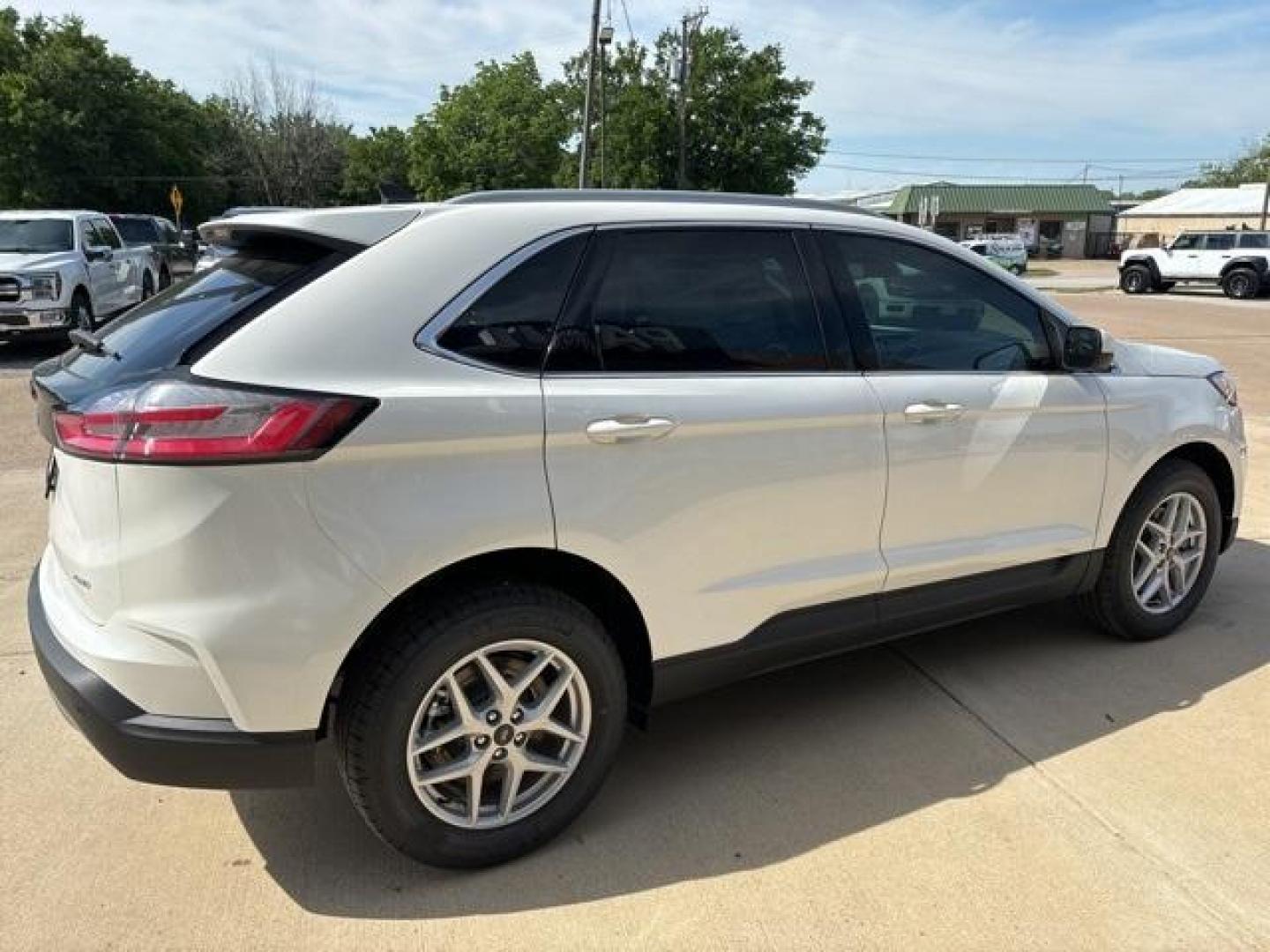 2024 Star White Metallic Tri-Coat /Dune Ford Edge (2FMPK4J99RB) with an EcoBoost 2.0L I4 GTDi DOHC Turbocharged VCT engine, Automatic transmission, located at 1105 E Mulberry, Kaufman, TX, 75142, (972) 962-2151, 32.589550, -96.300926 - Star White Metallic Tri-Coat 2024 Ford Edge 4D Sport Utility AWD 8-Speed Automatic EcoBoost 2.0L I4 GTDi DOHC Turbocharged VCT AWD.<br><br>21/28 City/Highway MPG<br><br><br>Please call Paul Murrey Ford Inc. In Kaufman Texas A Family Dealership Since 1952 Serving the Dallas Fort Worth and East Texas - Photo#6