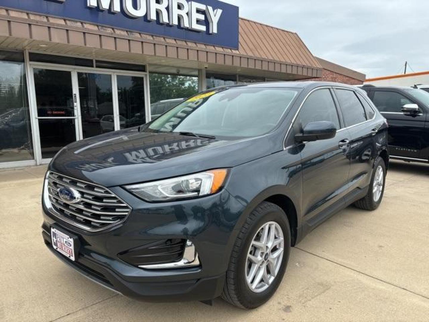 2022 Stone /Ebony Ford Edge SEL (2FMPK4J97NB) with an EcoBoost 2.0L I4 GTDi DOHC Turbocharged VCT engine, Automatic transmission, located at 1105 E Mulberry, Kaufman, TX, 75142, (972) 962-2151, 32.589550, -96.300926 - Stone 2022 Ford Edge 4D Sport Utility SEL AWD 8-Speed Automatic EcoBoost 2.0L I4 GTDi DOHC Turbocharged VCT AWD.<br><br><br>Odometer is 26120 miles below market average! 21/28 City/Highway MPG<br><br><br>Please call Paul Murrey Ford Inc. In Kaufman Texas A Family Dealership Since 1952 Serving the Da - Photo#1