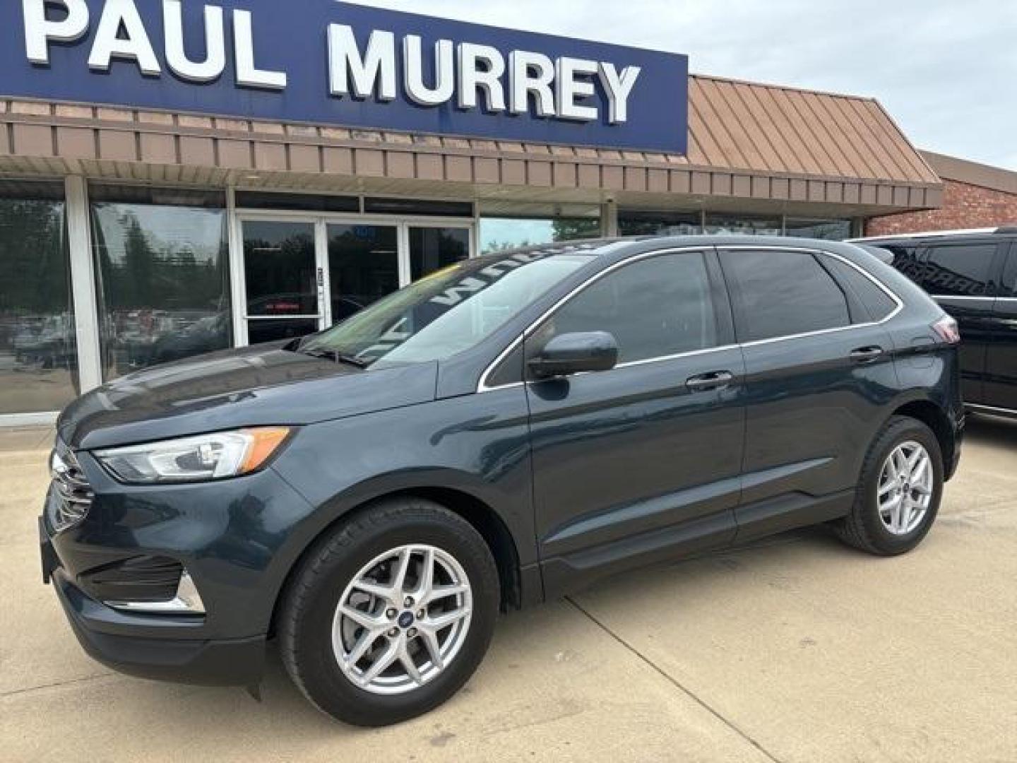 2022 Stone /Ebony Ford Edge SEL (2FMPK4J97NB) with an EcoBoost 2.0L I4 GTDi DOHC Turbocharged VCT engine, Automatic transmission, located at 1105 E Mulberry, Kaufman, TX, 75142, (972) 962-2151, 32.589550, -96.300926 - Stone 2022 Ford Edge 4D Sport Utility SEL AWD 8-Speed Automatic EcoBoost 2.0L I4 GTDi DOHC Turbocharged VCT AWD.<br><br><br>Odometer is 26120 miles below market average! 21/28 City/Highway MPG<br><br><br>Please call Paul Murrey Ford Inc. In Kaufman Texas A Family Dealership Since 1952 Serving the Da - Photo#2