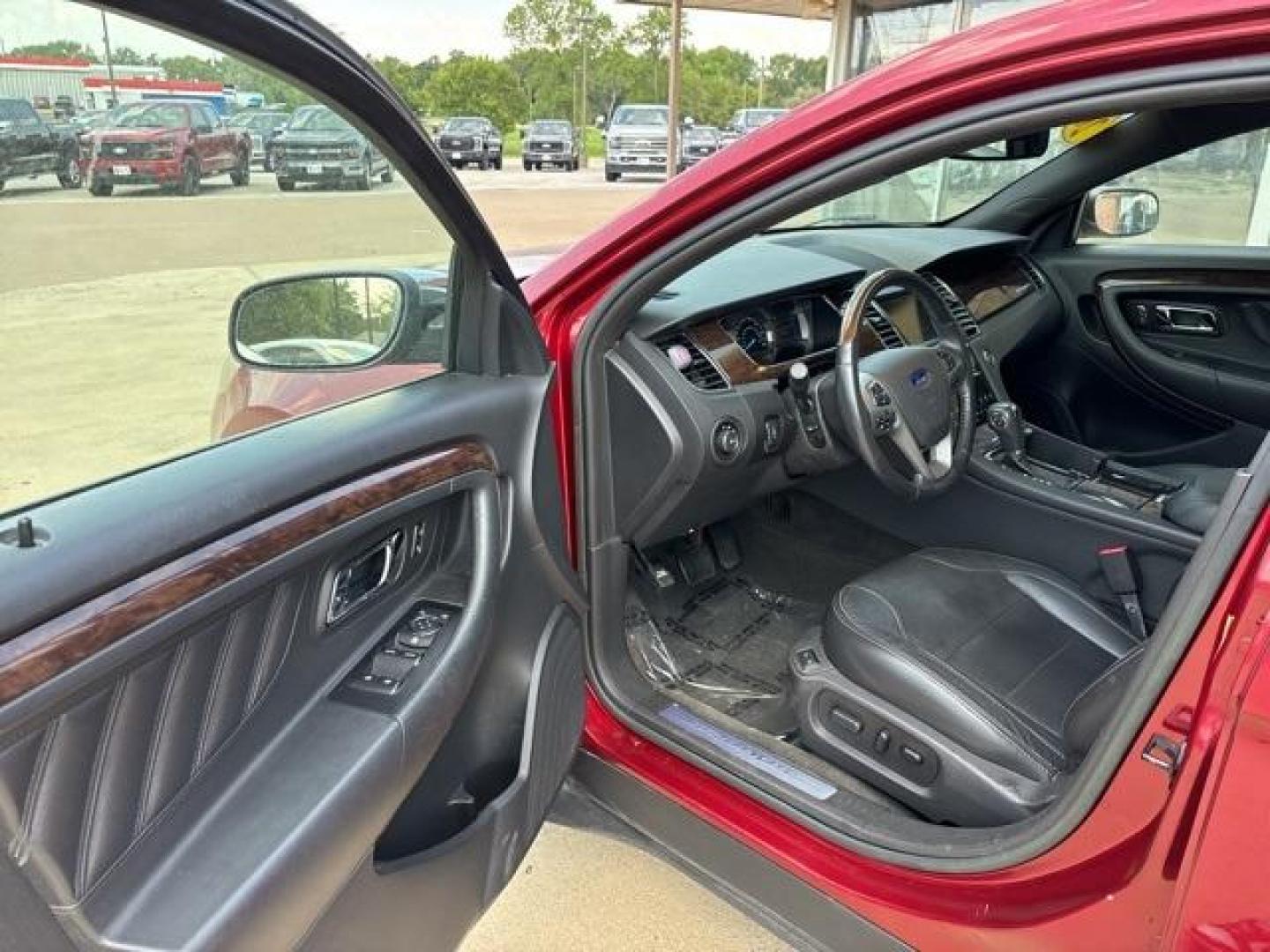 2013 Ruby Red Metallic Tinted Clearcoat /Charcoal Black Ford Taurus Limited (1FAHP2F81DG) with an 3.5L 6-Cylinder SMPI DOHC engine, Automatic transmission, located at 1105 E Mulberry, Kaufman, TX, 75142, (972) 962-2151, 32.589550, -96.300926 - Ruby Red Metallic Tinted Clearcoat 2013 Ford Taurus 4D Sedan Limited FWD 6-Speed Automatic with Select-Shift 3.5L 6-Cylinder SMPI DOHC<br><br><br>19/29 City/Highway MPG<br><br>Awards:<br> * Ward's 10 Best Engines * 2013 KBB.com Brand Image Awards<br>Please call Paul Murrey Ford Inc. In Kaufman Te - Photo#8