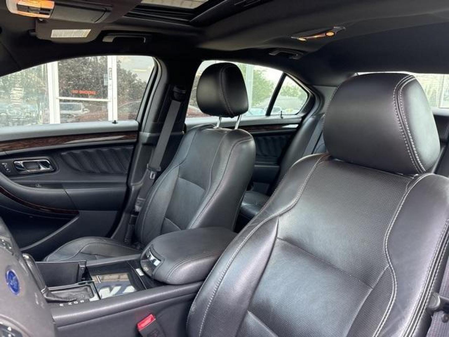 2013 Ruby Red Metallic Tinted Clearcoat /Charcoal Black Ford Taurus Limited (1FAHP2F81DG) with an 3.5L 6-Cylinder SMPI DOHC engine, Automatic transmission, located at 1105 E Mulberry, Kaufman, TX, 75142, (972) 962-2151, 32.589550, -96.300926 - Ruby Red Metallic Tinted Clearcoat 2013 Ford Taurus 4D Sedan Limited FWD 6-Speed Automatic with Select-Shift 3.5L 6-Cylinder SMPI DOHC<br><br><br>19/29 City/Highway MPG<br><br>Awards:<br> * Ward's 10 Best Engines * 2013 KBB.com Brand Image Awards<br>Please call Paul Murrey Ford Inc. In Kaufman Te - Photo#10