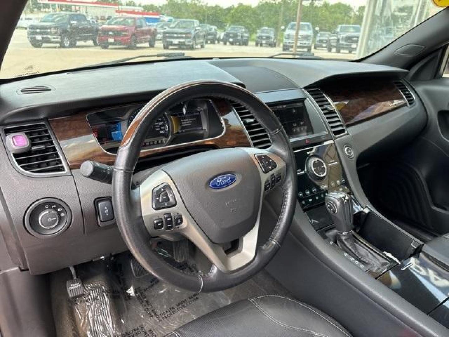 2013 Ruby Red Metallic Tinted Clearcoat /Charcoal Black Ford Taurus Limited (1FAHP2F81DG) with an 3.5L 6-Cylinder SMPI DOHC engine, Automatic transmission, located at 1105 E Mulberry, Kaufman, TX, 75142, (972) 962-2151, 32.589550, -96.300926 - Ruby Red Metallic Tinted Clearcoat 2013 Ford Taurus 4D Sedan Limited FWD 6-Speed Automatic with Select-Shift 3.5L 6-Cylinder SMPI DOHC<br><br><br>19/29 City/Highway MPG<br><br>Awards:<br> * Ward's 10 Best Engines * 2013 KBB.com Brand Image Awards<br>Please call Paul Murrey Ford Inc. In Kaufman Te - Photo#11