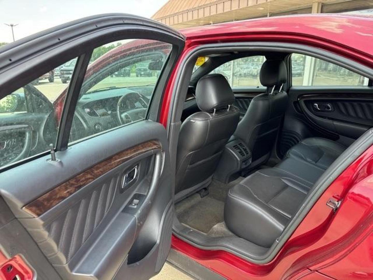 2013 Ruby Red Metallic Tinted Clearcoat /Charcoal Black Ford Taurus Limited (1FAHP2F81DG) with an 3.5L 6-Cylinder SMPI DOHC engine, Automatic transmission, located at 1105 E Mulberry, Kaufman, TX, 75142, (972) 962-2151, 32.589550, -96.300926 - Ruby Red Metallic Tinted Clearcoat 2013 Ford Taurus 4D Sedan Limited FWD 6-Speed Automatic with Select-Shift 3.5L 6-Cylinder SMPI DOHC<br><br><br>19/29 City/Highway MPG<br><br>Awards:<br> * Ward's 10 Best Engines * 2013 KBB.com Brand Image Awards<br>Please call Paul Murrey Ford Inc. In Kaufman Te - Photo#12