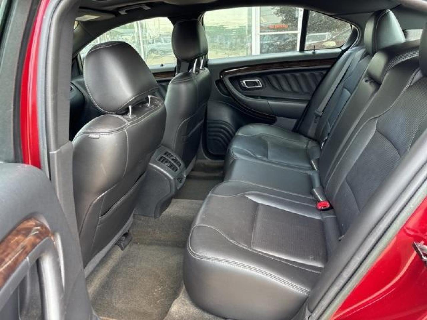 2013 Ruby Red Metallic Tinted Clearcoat /Charcoal Black Ford Taurus Limited (1FAHP2F81DG) with an 3.5L 6-Cylinder SMPI DOHC engine, Automatic transmission, located at 1105 E Mulberry, Kaufman, TX, 75142, (972) 962-2151, 32.589550, -96.300926 - Ruby Red Metallic Tinted Clearcoat 2013 Ford Taurus 4D Sedan Limited FWD 6-Speed Automatic with Select-Shift 3.5L 6-Cylinder SMPI DOHC<br><br><br>19/29 City/Highway MPG<br><br>Awards:<br> * Ward's 10 Best Engines * 2013 KBB.com Brand Image Awards<br>Please call Paul Murrey Ford Inc. In Kaufman Te - Photo#13