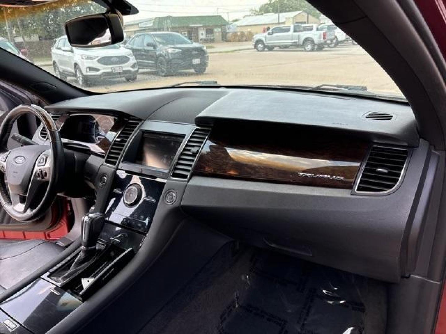 2013 Ruby Red Metallic Tinted Clearcoat /Charcoal Black Ford Taurus Limited (1FAHP2F81DG) with an 3.5L 6-Cylinder SMPI DOHC engine, Automatic transmission, located at 1105 E Mulberry, Kaufman, TX, 75142, (972) 962-2151, 32.589550, -96.300926 - Ruby Red Metallic Tinted Clearcoat 2013 Ford Taurus 4D Sedan Limited FWD 6-Speed Automatic with Select-Shift 3.5L 6-Cylinder SMPI DOHC<br><br><br>19/29 City/Highway MPG<br><br>Awards:<br> * Ward's 10 Best Engines * 2013 KBB.com Brand Image Awards<br>Please call Paul Murrey Ford Inc. In Kaufman Te - Photo#16