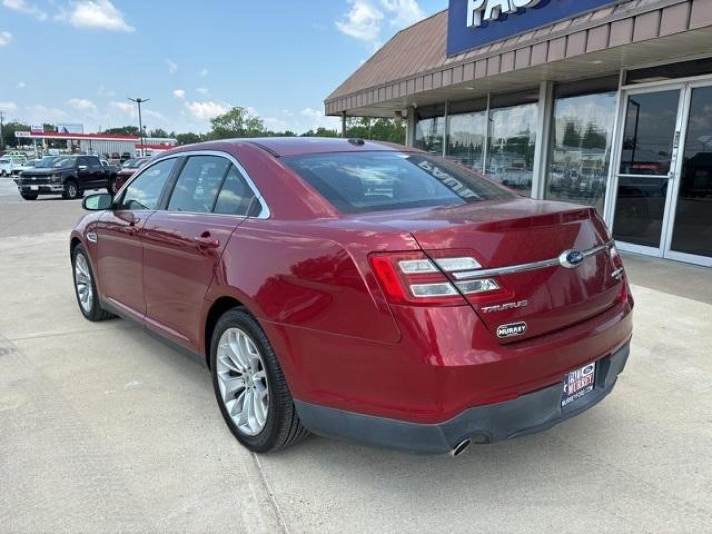 2013 Ruby Red Metallic Tinted Clearcoat /Charcoal Black Ford Taurus Limited (1FAHP2F81DG) with an 3.5L 6-Cylinder SMPI DOHC engine, Automatic transmission, located at 1105 E Mulberry, Kaufman, TX, 75142, (972) 962-2151, 32.589550, -96.300926 - Ruby Red Metallic Tinted Clearcoat 2013 Ford Taurus 4D Sedan Limited FWD 6-Speed Automatic with Select-Shift 3.5L 6-Cylinder SMPI DOHC<br><br><br>19/29 City/Highway MPG<br><br>Awards:<br> * Ward's 10 Best Engines * 2013 KBB.com Brand Image Awards<br>Please call Paul Murrey Ford Inc. In Kaufman Te - Photo#3