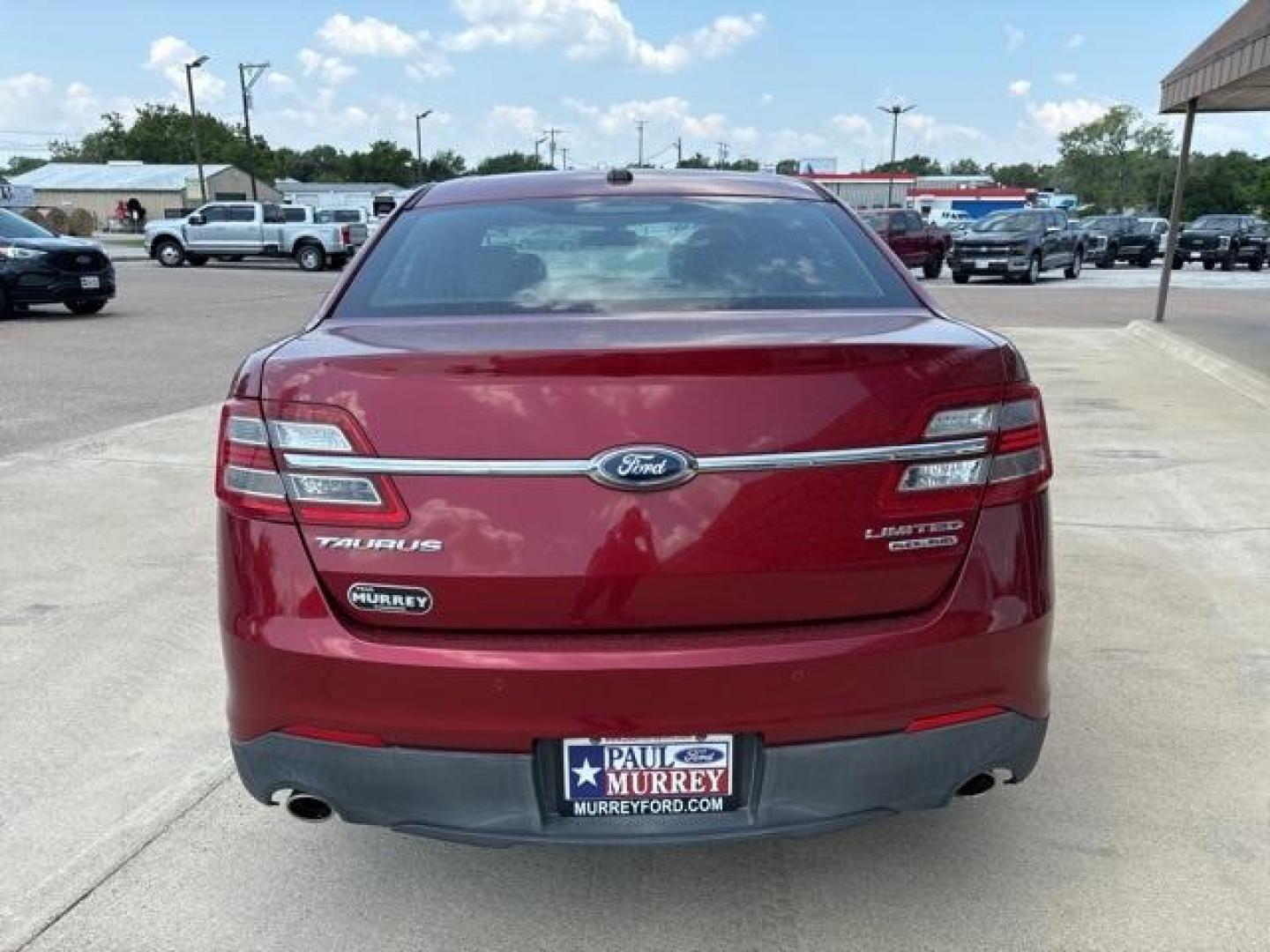 2013 Ruby Red Metallic Tinted Clearcoat /Charcoal Black Ford Taurus Limited (1FAHP2F81DG) with an 3.5L 6-Cylinder SMPI DOHC engine, Automatic transmission, located at 1105 E Mulberry, Kaufman, TX, 75142, (972) 962-2151, 32.589550, -96.300926 - Ruby Red Metallic Tinted Clearcoat 2013 Ford Taurus 4D Sedan Limited FWD 6-Speed Automatic with Select-Shift 3.5L 6-Cylinder SMPI DOHC<br><br><br>19/29 City/Highway MPG<br><br>Awards:<br> * Ward's 10 Best Engines * 2013 KBB.com Brand Image Awards<br>Please call Paul Murrey Ford Inc. In Kaufman Te - Photo#4