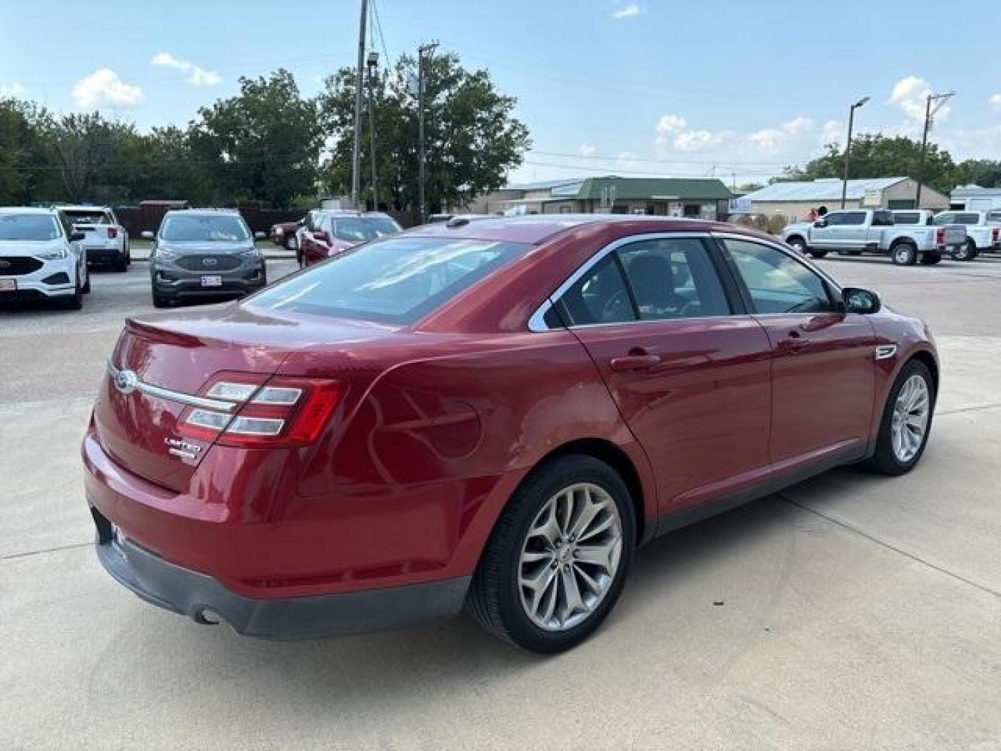 2013 Ruby Red Metallic Tinted Clearcoat /Charcoal Black Ford Taurus Limited (1FAHP2F81DG) with an 3.5L 6-Cylinder SMPI DOHC engine, Automatic transmission, located at 1105 E Mulberry, Kaufman, TX, 75142, (972) 962-2151, 32.589550, -96.300926 - Ruby Red Metallic Tinted Clearcoat 2013 Ford Taurus 4D Sedan Limited FWD 6-Speed Automatic with Select-Shift 3.5L 6-Cylinder SMPI DOHC<br><br><br>19/29 City/Highway MPG<br><br>Awards:<br> * Ward's 10 Best Engines * 2013 KBB.com Brand Image Awards<br>Please call Paul Murrey Ford Inc. In Kaufman Te - Photo#5