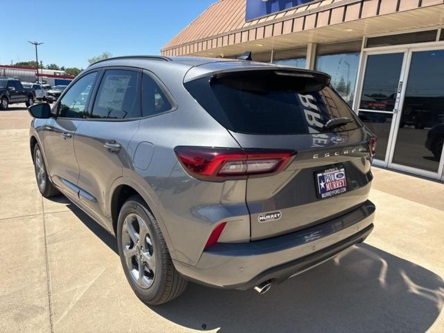 2024 Carbonized Gray Metallic /Ebony W/Red Stitch Ford Escape ST-Line (1FMCU0MN6RU) with an 1.5L EcoBoost engine, Automatic transmission, located at 1105 E Mulberry, Kaufman, TX, 75142, (972) 962-2151, 32.589550, -96.300926 - Carbonized Gray Metallic 2024 Ford Escape 4D Sport Utility ST-Line FWD 8-Speed Automatic 1.5L EcoBoost<br><br>27/34 City/Highway MPG<br><br><br>Please call Paul Murrey Ford Inc. In Kaufman Texas A Family Dealership Since 1952 Serving the Dallas Fort Worth and East Texas areas for over 70 years. Plea - Photo#4