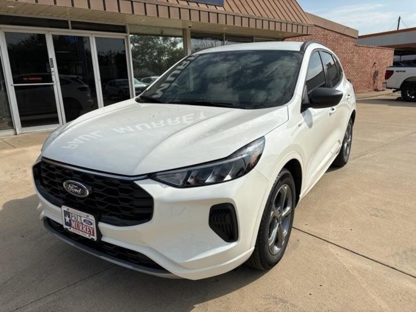 2024 Star White Metallic Tri-Coat /Ebony W/Red Stitch Ford Escape ST-Line (1FMCU0MNXRU) with an 1.5L EcoBoost engine, Automatic transmission, located at 1105 E Mulberry, Kaufman, TX, 75142, (972) 962-2151, 32.589550, -96.300926 - Star White Metallic Tri-Coat 2024 Ford Escape 4D Sport Utility ST-Line FWD 8-Speed Automatic 1.5L EcoBoost<br><br>Recent Arrival! 27/34 City/Highway MPG<br><br><br>Please call Paul Murrey Ford Inc. In Kaufman Texas A Family Dealership Since 1952 Serving the Dallas Fort Worth and East Texas areas for - Photo#1