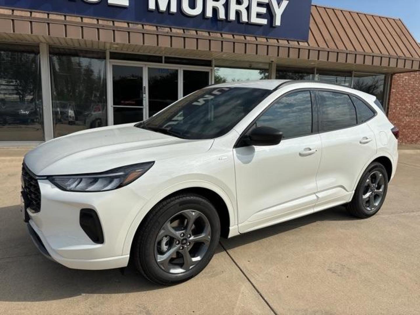 2024 Star White Metallic Tri-Coat /Ebony W/Red Stitch Ford Escape ST-Line (1FMCU0MNXRU) with an 1.5L EcoBoost engine, Automatic transmission, located at 1105 E Mulberry, Kaufman, TX, 75142, (972) 962-2151, 32.589550, -96.300926 - Star White Metallic Tri-Coat 2024 Ford Escape 4D Sport Utility ST-Line FWD 8-Speed Automatic 1.5L EcoBoost<br><br>Recent Arrival! 27/34 City/Highway MPG<br><br><br>Please call Paul Murrey Ford Inc. In Kaufman Texas A Family Dealership Since 1952 Serving the Dallas Fort Worth and East Texas areas for - Photo#2