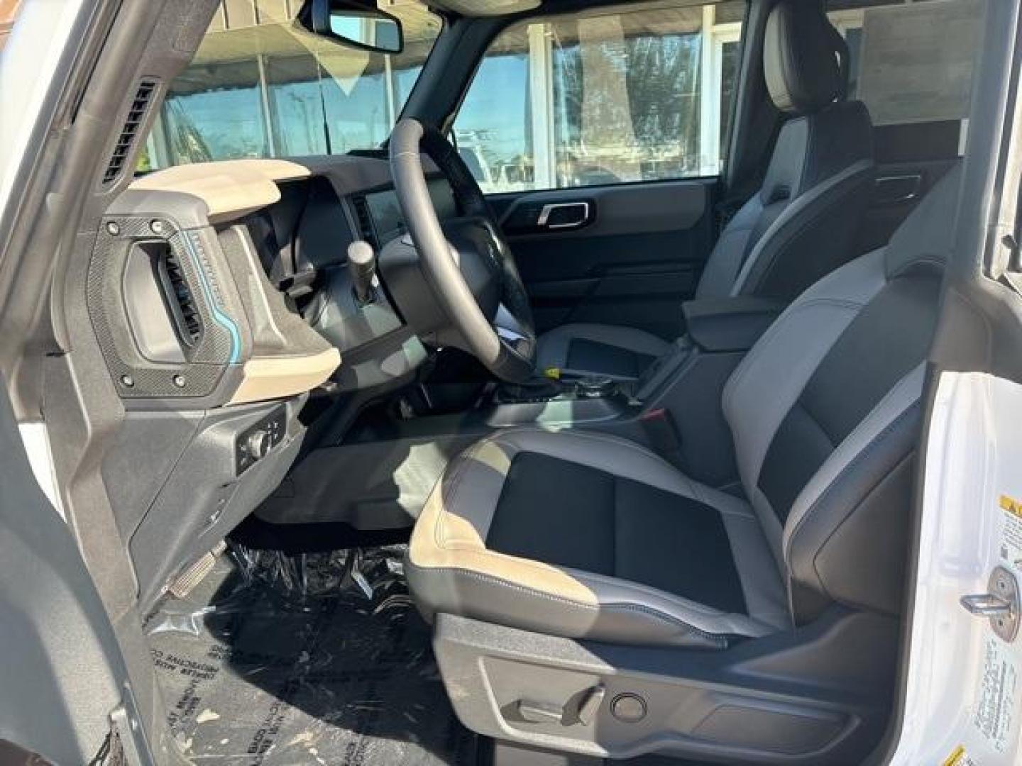 2024 Oxford White /Black Onyx Interior Ford Bronco Wildtrak (1FMEE2BP9RL) with an 2.7L EcoBoost V6 engine, Automatic transmission, located at 1105 E Mulberry, Kaufman, TX, 75142, (972) 962-2151, 32.589550, -96.300926 - Oxford White 2024 Ford Bronco 4D Sport Utility Wildtrak 4WD 10-Speed Automatic 2.7L EcoBoost V6<br><br>Recent Arrival!<br><br><br>Please call Paul Murrey Ford Inc. In Kaufman Texas A Family Dealership Since 1952 Serving the Dallas Fort Worth and East Texas areas for over 70 years. Please call 972-96 - Photo#10