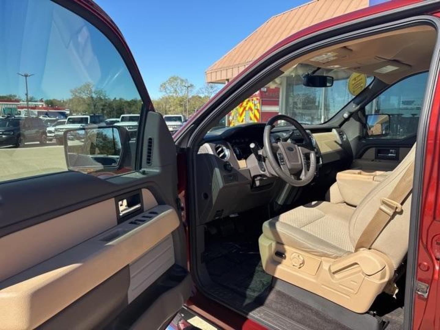 2014 Sunset Red Ford F-150 (1FTFW1CF9EK) with an 5.0L V8 FFV engine, Automatic transmission, located at 1105 E Mulberry, Kaufman, TX, 75142, (972) 962-2151, 32.589550, -96.300926 - Sunset Red 2014 Ford F-150 4D SuperCrew RWD 6-Speed Automatic Electronic 5.0L V8 FFV Priced below KBB Fair Purchase Price!<br><br><br>Recent Arrival! Odometer is 64802 miles below market average!<br><br>Awards:<br> * 2014 KBB.com Brand Image Awards<br>Please call Paul Murrey Ford Inc. In Kaufman Te - Photo#9