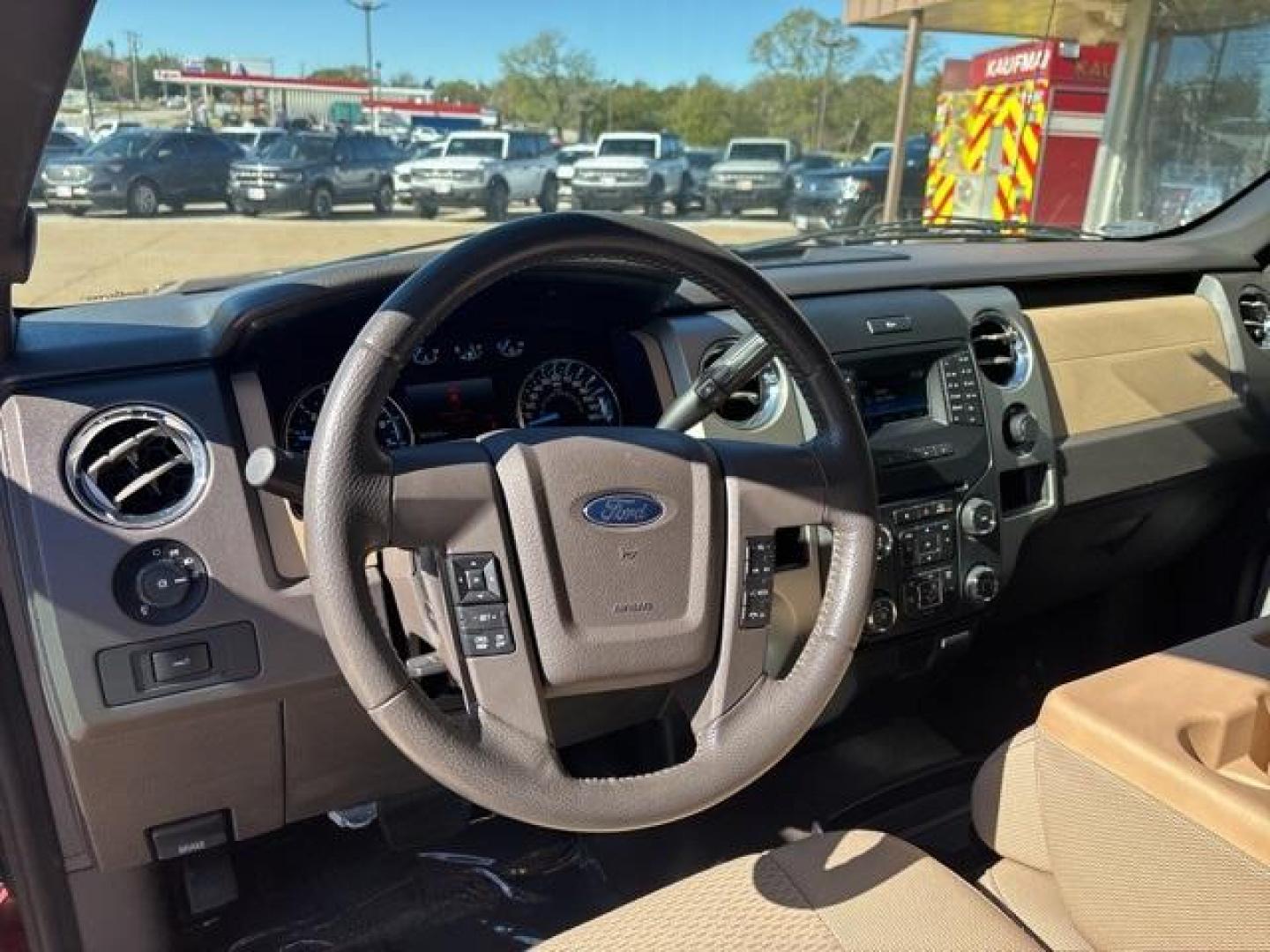 2014 Sunset Red Ford F-150 (1FTFW1CF9EK) with an 5.0L V8 FFV engine, Automatic transmission, located at 1105 E Mulberry, Kaufman, TX, 75142, (972) 962-2151, 32.589550, -96.300926 - Sunset Red 2014 Ford F-150 4D SuperCrew RWD 6-Speed Automatic Electronic 5.0L V8 FFV Priced below KBB Fair Purchase Price!<br><br><br>Recent Arrival! Odometer is 64802 miles below market average!<br><br>Awards:<br> * 2014 KBB.com Brand Image Awards<br>Please call Paul Murrey Ford Inc. In Kaufman Te - Photo#12