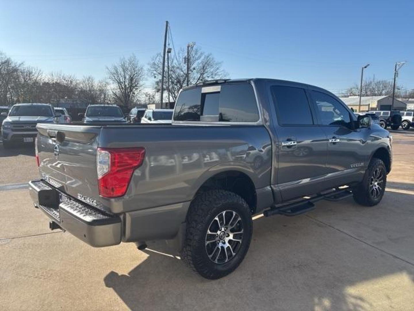 2021 Gun Metallic /Black Nissan Titan SV (1N6AA1EC9MN) with an 5.6L V8 DOHC 32V 400hp engine, Automatic transmission, located at 1105 E Mulberry, Kaufman, TX, 75142, (972) 962-2151, 32.589550, -96.300926 - Gun Metallic 2021 Nissan Titan 4D Crew Cab SV 4WD 9-Speed Automatic 5.6L V8 DOHC 32V 400hp 4WD. Priced below KBB Fair Purchase Price!<br><br><br>Odometer is 36522 miles below market average!<br><br><br>Please call Paul Murrey Ford Inc. In Kaufman Texas A Family Dealership Since 1952 Serving the Dall - Photo#5